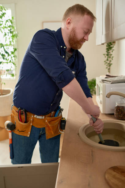 istock Worker repairing blockage in the sink 1485410487