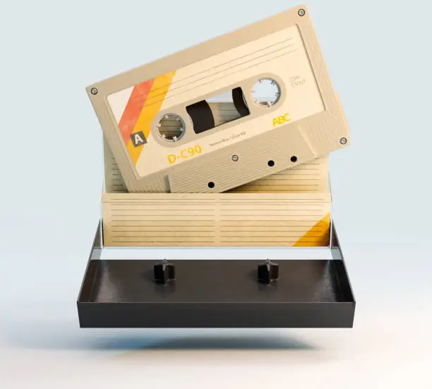 A concept of a recordable aduio cassette tape with a platic cover and cardboard insert - 3D render