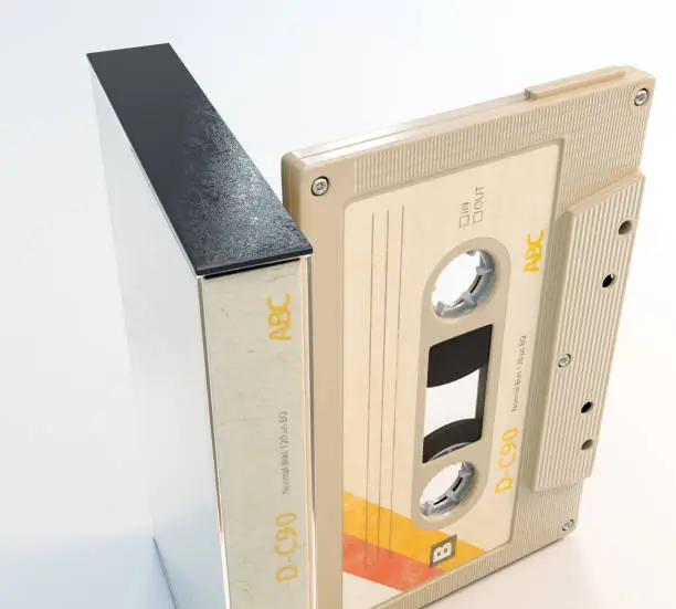 A concept of a recordable aduio cassette tape with a platic cover and cardboard insert - 3D render