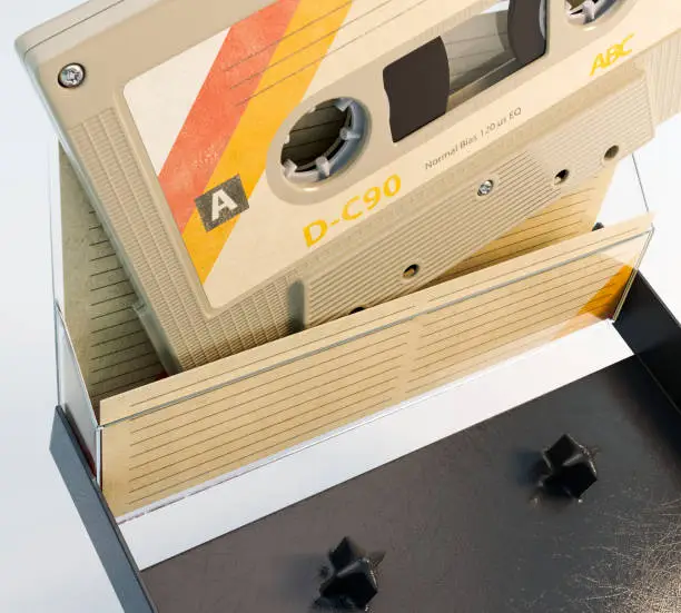 A concept of a recordable aduio cassette tape with a platic cover and cardboard insert - 3D render