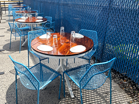 Table with chairs  outside a restaurant