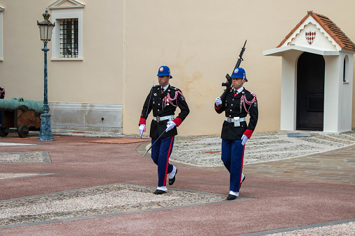 Monte-Ville, Monaco, April 21st 2023:- Members of the Compagnie des Carabiniers du Prince during the changing of the guard ceremony, performed daily at 11:55am
