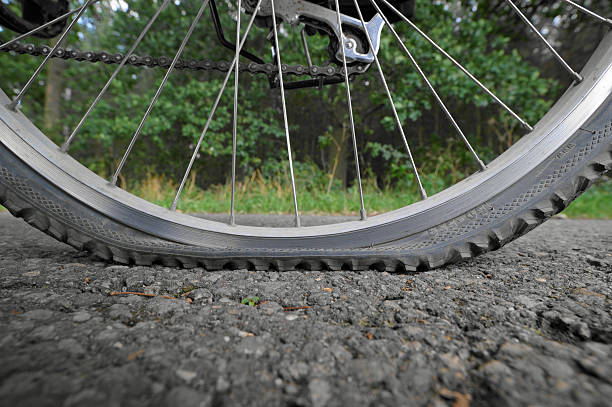 Plater Tires Broken Bicycle Tires. flat tire stock pictures, royalty-free photos & images