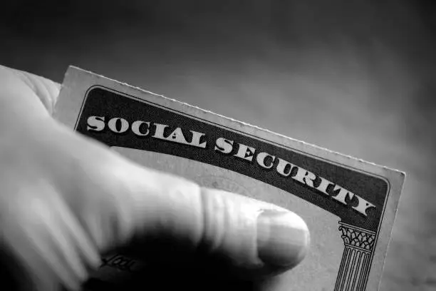 Photo of Social Security Cards Symbolizing Benefits for Elderly United Stated