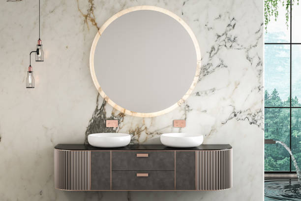 istock A luxurious bathroom with a double sink vanity, marble walls, concrete flooring, a small pool, and a forest view from the window.3d rendering 1485425990