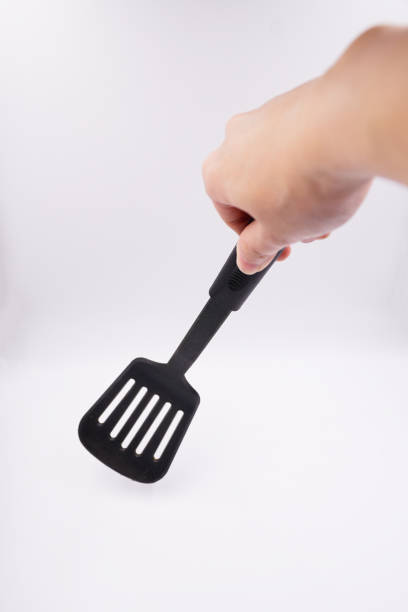 istock Black slotted turner cooking utensil 1485432260