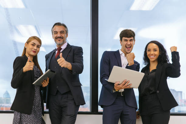 istock Successful group of business people at modern office. Team Brainstorm Working Concept. 1485433705