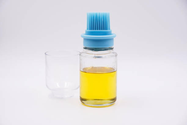 istock Silicone cooking oil glass bottle with basting brush and lid 1485433800