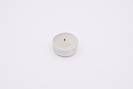 White tea lights candles with metal housing