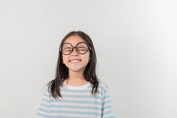 istock happy little girl, isolated on white 1485439334