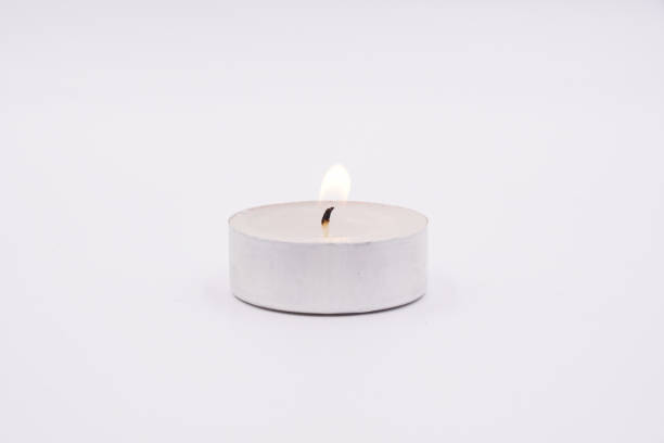 istock White tea lights candles with metal housing 1485441194