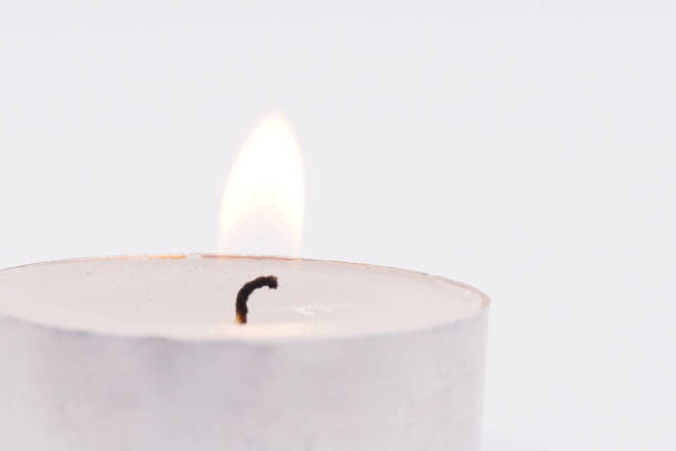 istock White tea lights candles with metal housing 1485441433