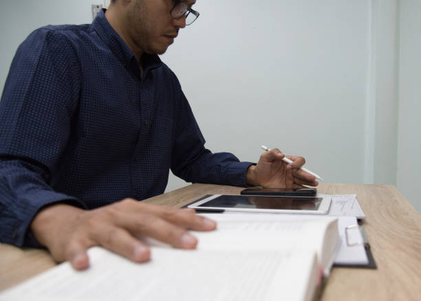 istock Businessman working at office with Digital tablet laptop computer smart phone using. 1485442991