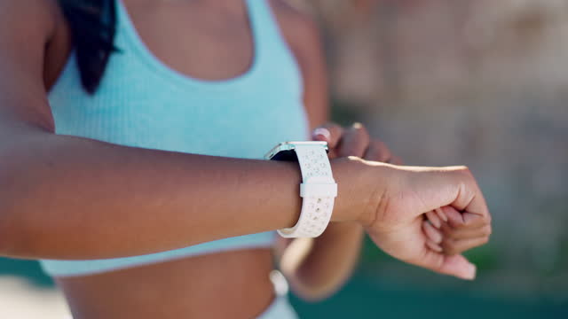 Fitness, tracker and hands of woman with smart watch outdoors for heart rate, progress and timing during training run. Cardio, pulse and girl with tracking app for time, app or monitor during workout