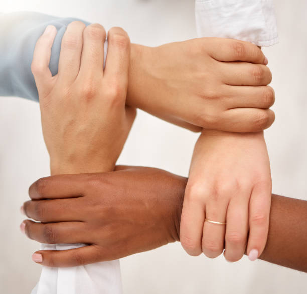 istock Unity, business team and holding hands for work community, support and teamwork. Team building, diversity and group collaboration motivation of corporate employees with solidarity and hope together 1485451594