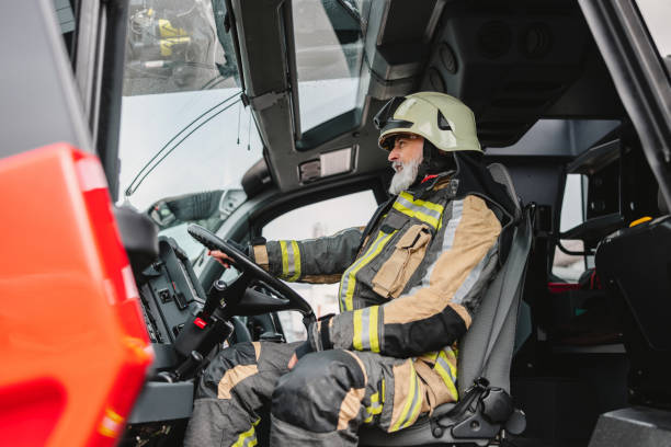 istock Brave Firefighter In A Truck 1485451882
