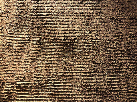 A Stucco Wall With A Wave Pattern In The Spotlight Stock Photo ...