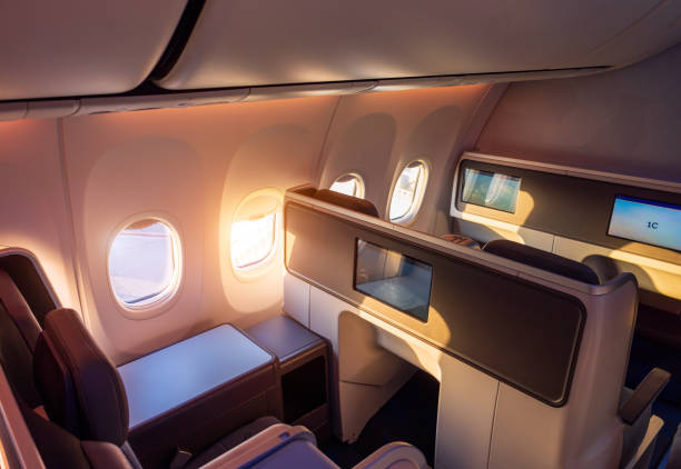 istock Modern airplane interiors, luxury first class and business class seats with entertainment area 1485471720