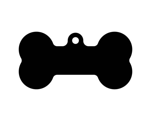 brelok z czarnej kości. zabawka z wiszącym nasadką i kształtem ciastka dla psa - kość stock illustrations