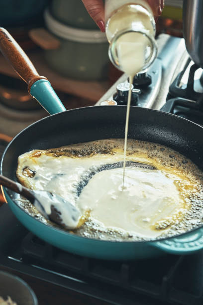 istock Preparing Fettuccine Pasta Alfredo with Parmesan 1485472423
