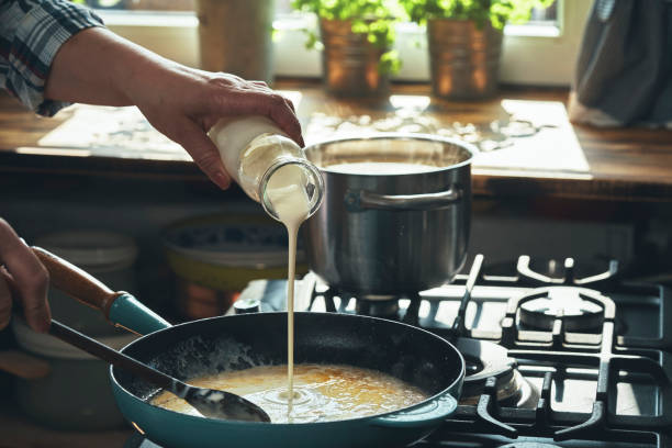 istock Preparing Fettuccine Pasta Alfredo with Parmesan 1485472477