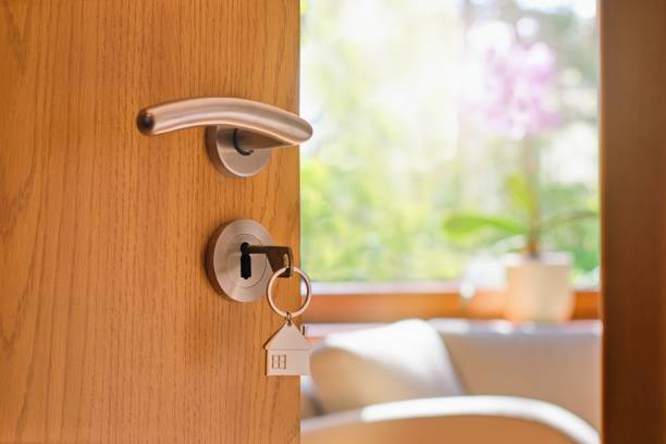istock Half opened door into the modern cozy home interior 1485474035