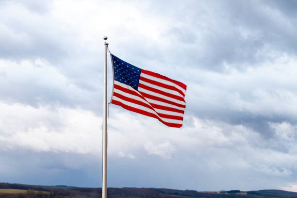 Flag of the USA over Clouds, with copy space