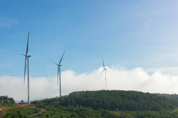 istock Renewable energy wind turbines windmill isolated on the beautiful blue sky, white clouds and on the tea fields in Da Lat, Lam Dong, Viet Nam 1485479312