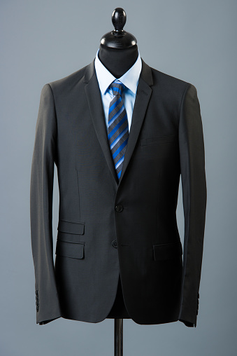 Black suit and blue tie
