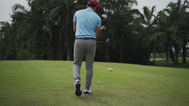 Male golf player on professional golf course.