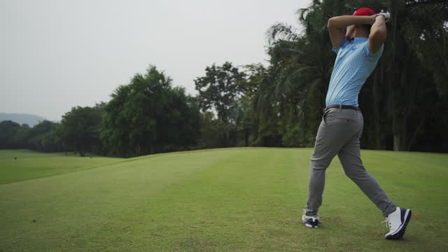 Male golf player on professional golf course.