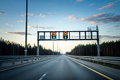 Riding at empty multiple lane highway at sunset