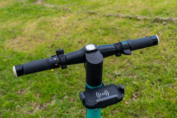 istock Electric scooter handlebar with smartphone holder. Closeup. 1485491084