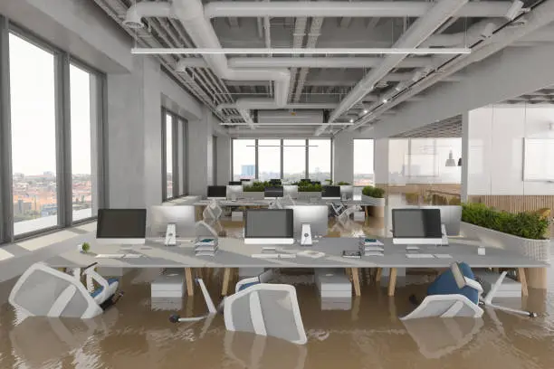 Photo of Flooded Office With Chairs Floating On Water