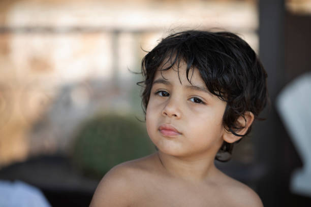 portrait little boy without t-shirt