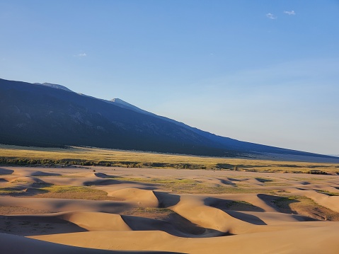 This is a photograph taken on a mobile phone outdoors in Great Sand Dunes National Park, Colorado during the summer of 2020