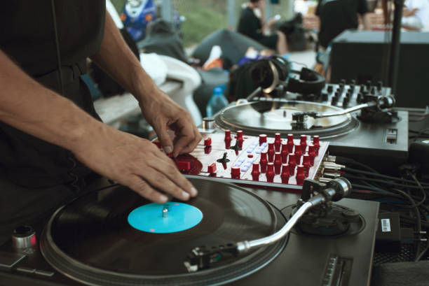 istock The Beat Goes On: Close-Up of a DJ Mixing Music