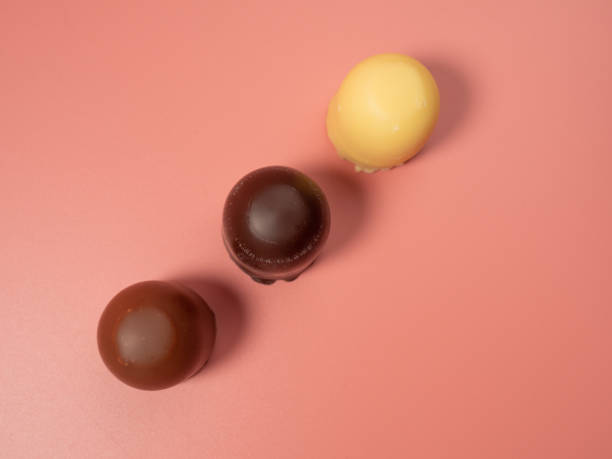 istock Chocolate covered marshmallow on a pink background. 1485508946