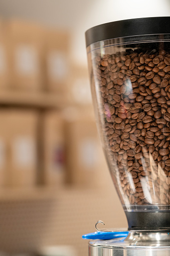 Wooden coffee mill and coffee beans