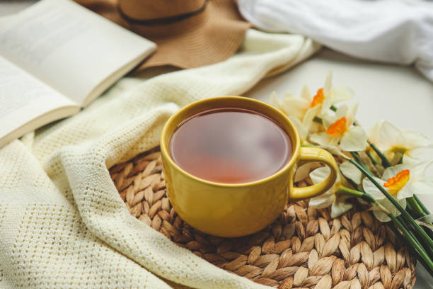 istock Cup of hot tea and spring home interior. good morning concept 1485514626