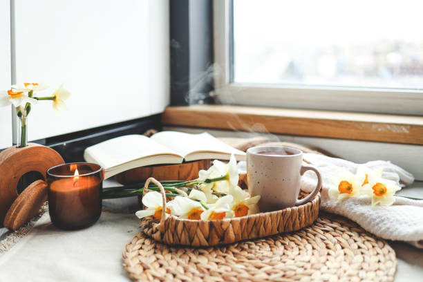 istock Cup of hot tea and spring home interior. good morning concept 1485516955