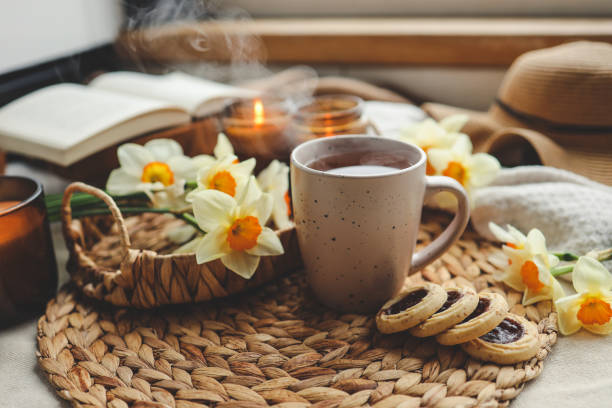 istock Cup of hot tea and spring home interior. good morning concept 1485517110