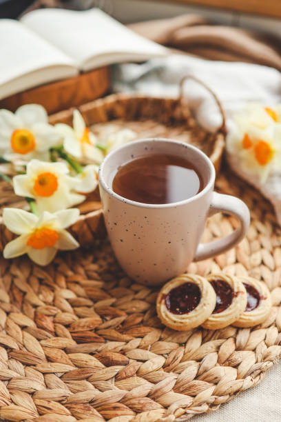 istock Cup of hot tea and spring home interior. good morning concept 1485517132