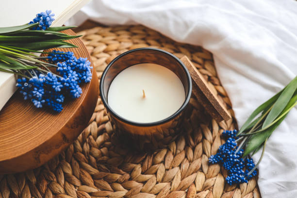 istock Candle and flowers in home atmospheric interior 1485518131