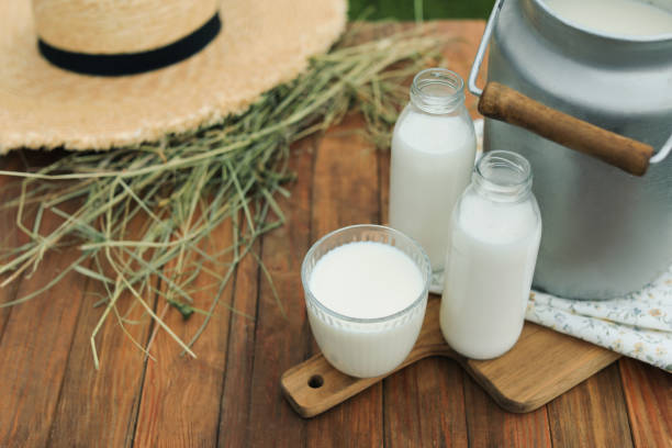istock Fresh milk on wooden table. Space for text 1485520268