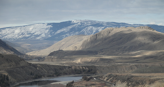 Juniper Beach Provincial Park, Canada - April 2, 2023: View from the Trans-Canada Highway of scenic Juniper Beach Provincial Park by the Thompson River. Two railroad tracks pass through this area. Spring morning in the Thompson-Nicola Regional District.