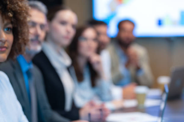 istock Defocussed image Group of people listening to a presentation 1485528765