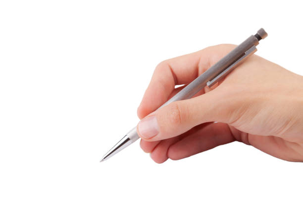 istock Man writing with a simple modern silver pen, hand isolated on white background, cut out, writing gesture, hand closeup. Signing a document, pointing with a pen, circling, exam writing, filling a form 1485532341