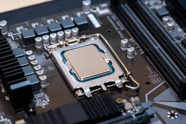 istock Modern CPU processor installed on a brand new motherboard, object detail, extreme closeup, nobody. Simple generic powerful high end gaming CPU up close, desktop PC up close, parts, components upgrade 1485532396