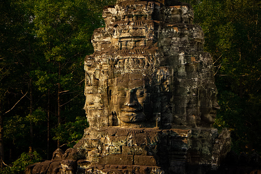 Bayon Temple is a striking and enigmatic temple complex located at the heart of Angkor Thom, the ancient capital city of the Khmer Empire in present-day Cambodia. Built in the late 12th and early 13th centuries, the temple is renowned for its towering stone faces and intricate carvings.

The temple was built by King Jayavarman VII, who sought to create a temple that represented both his Buddhist beliefs and the power and might of the Khmer Empire. Bayon Temple is therefore a unique blend of Buddhist and Hindu iconography, with over 200 carved faces of Avalokiteshvara, the Buddhist bodhisattva of compassion, and numerous scenes from Hindu mythology.